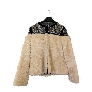 Faux fur jacket with studs